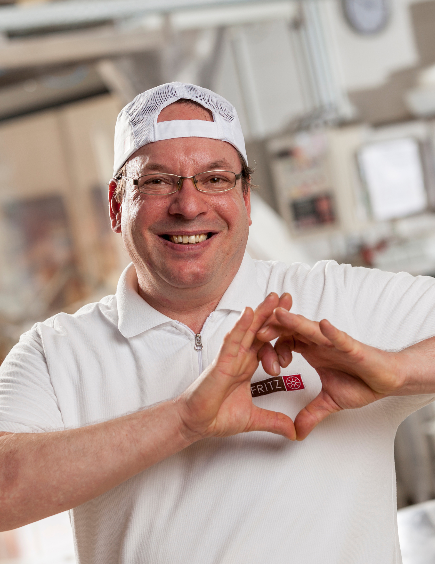 Bäcker von FRITZ Mühlenbäckerei aus München bei der Arbeit